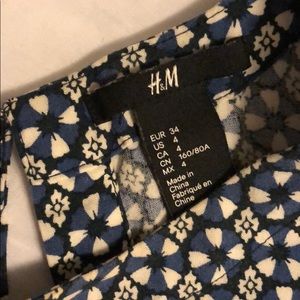 Round neck baby doll dress.